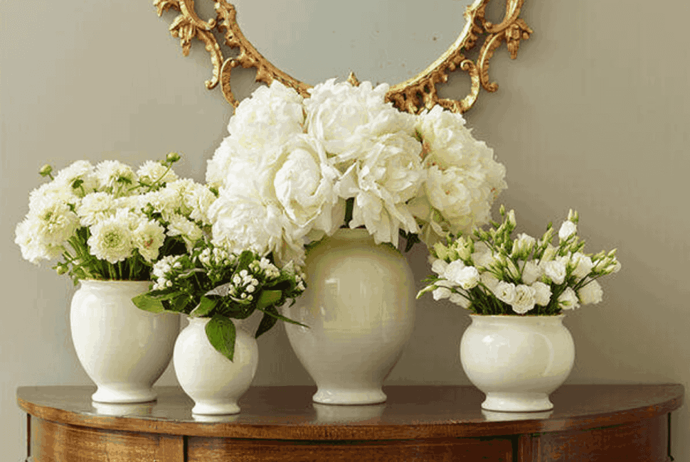White vases with flowers