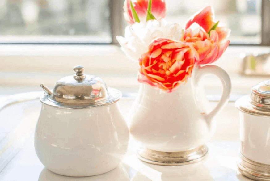 a pitcher with flowers